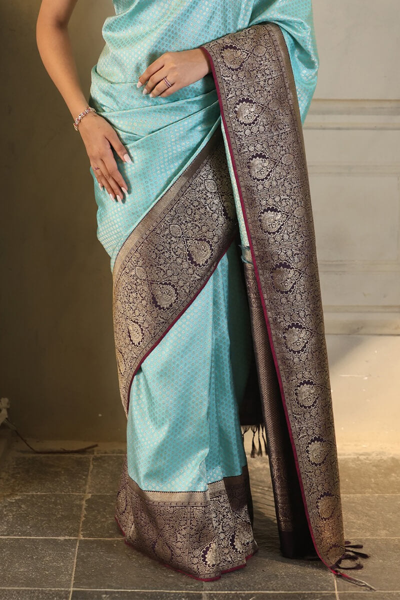 Enigmatic Firozi Soft Silk Saree With Glittering Blouse Piece