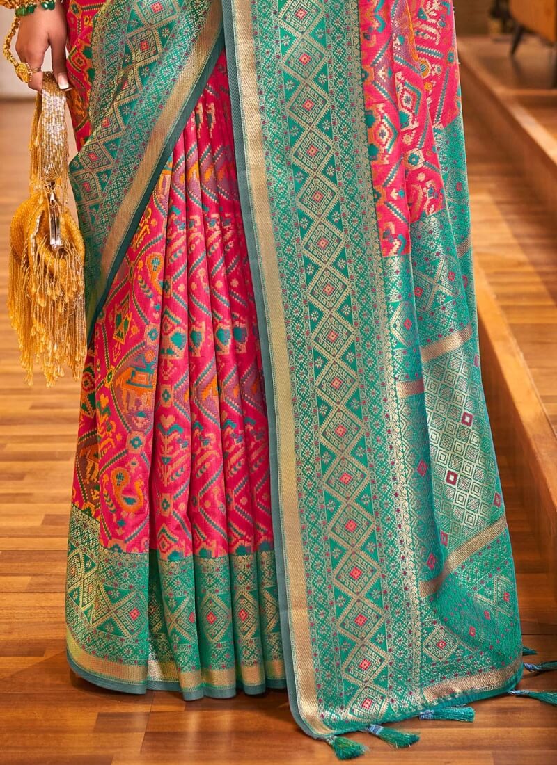 Sizzling Dark Pink Patola Silk Saree with Adorning Blouse Piece