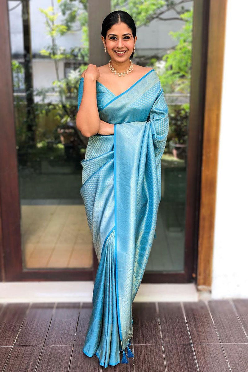 Deserving Firozi Soft Silk Saree with Comely Blouse Piece