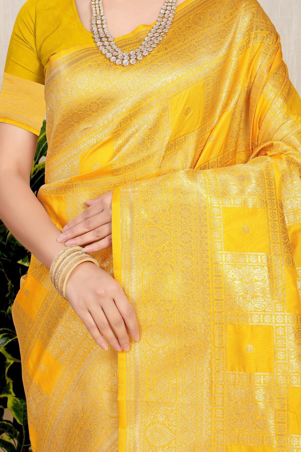 Eye-catching Yellow Kanjivaram Silk Saree With Glittering Blouse Piece