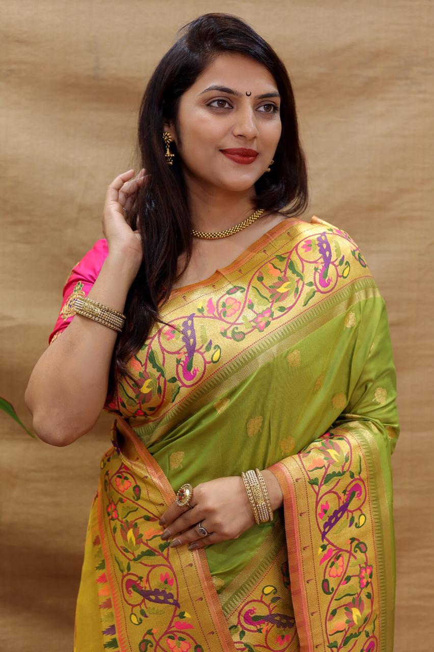 Outstanding Green Paithani Silk Saree With Appealing Blouse Piece