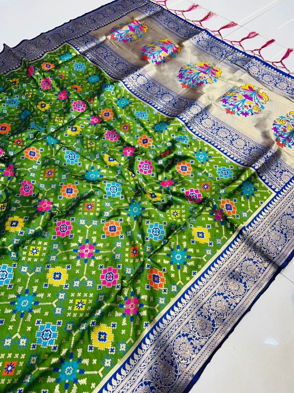 Stylish Green Soft Patola Silk Saree with Demanding Blouse Piece