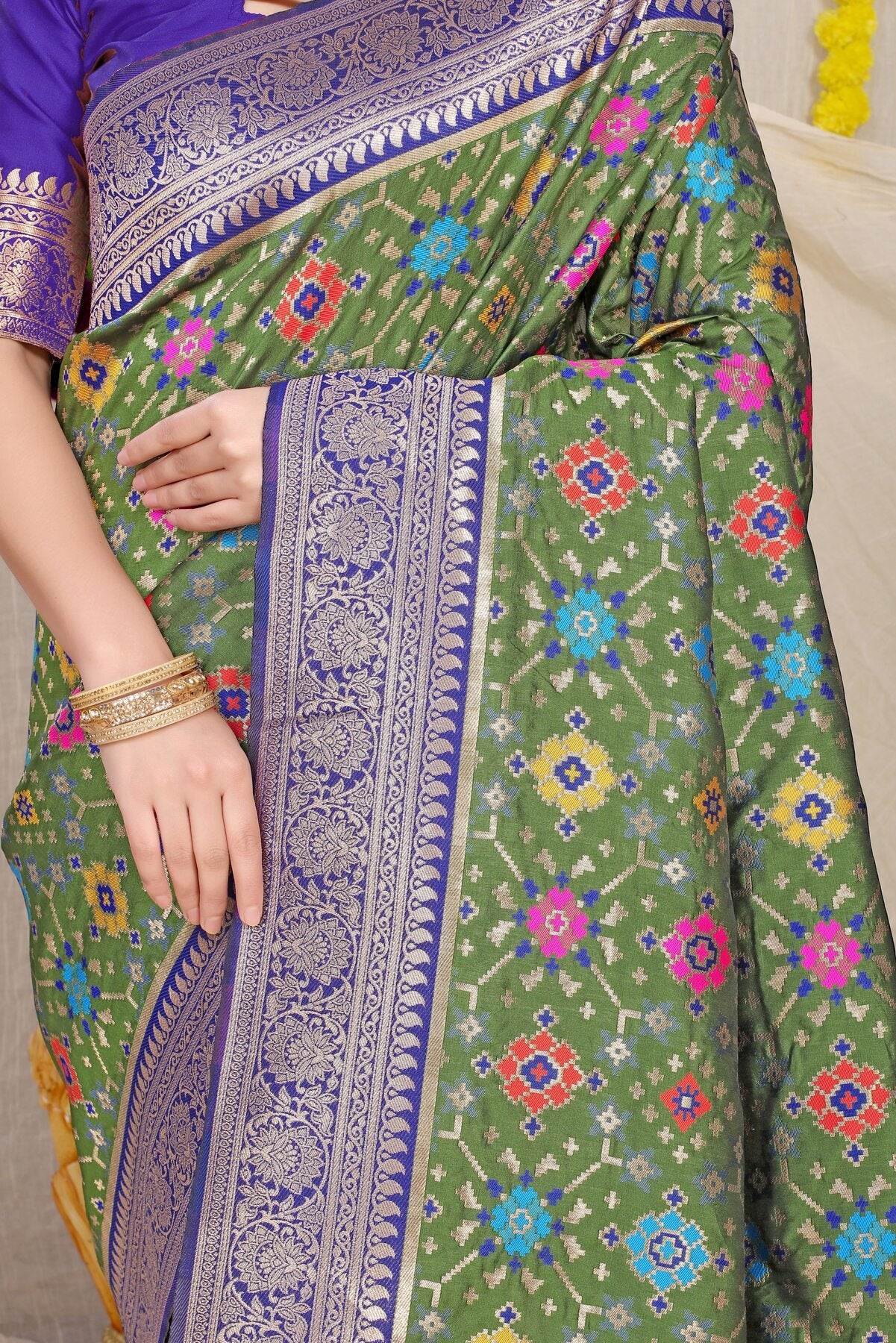 Stylish Green Soft Patola Silk Saree with Demanding Blouse Piece