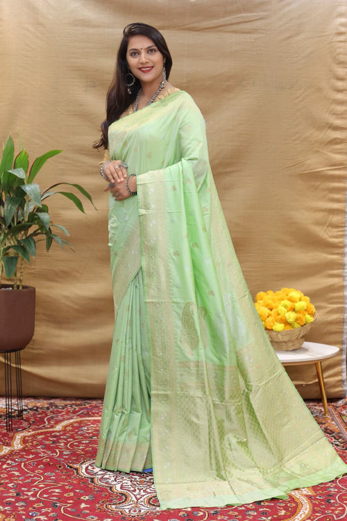 Snazzy Pista Soft Banarasi Silk Saree With Profuse Blouse Piece