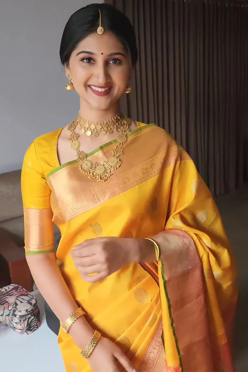 Elegant Yellow Silk Saree with Green Border Saree