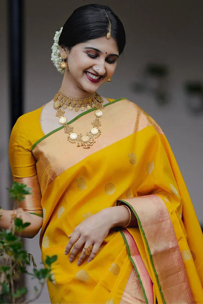 Elegant Yellow Silk Saree with Green Border Saree