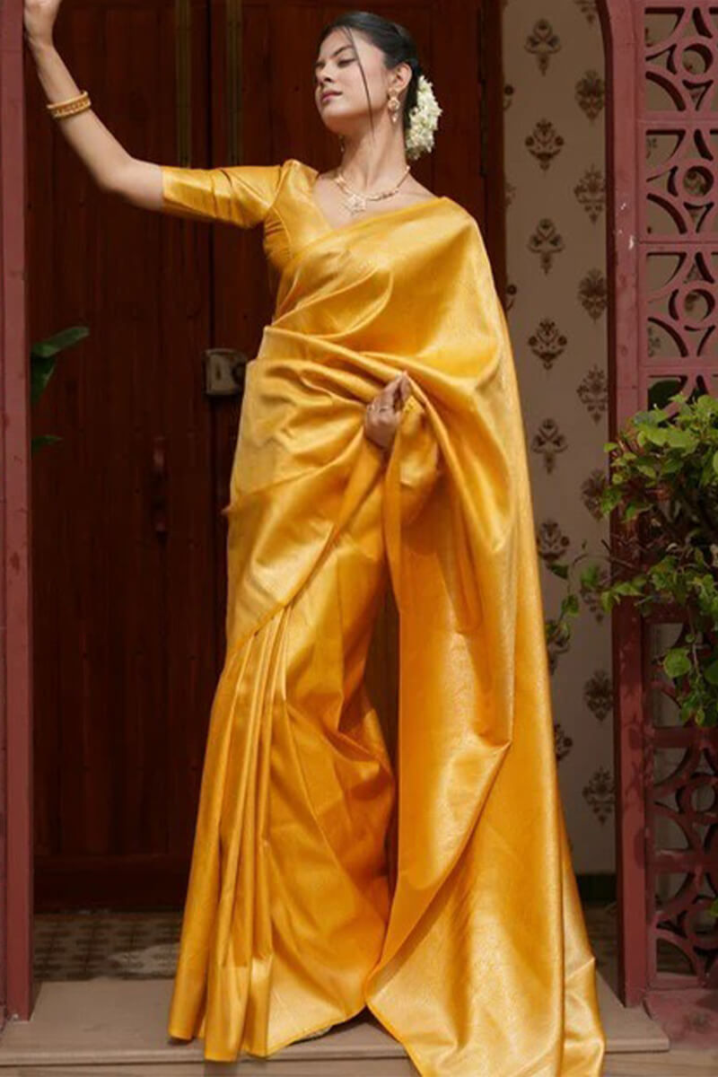 Embrocation Yellow Soft Silk Saree With Aplomb Blouse Piece