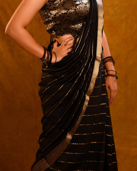 Sensational Black Soft Silk Saree With Precious Blouse Piece