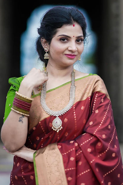 Engrossing Wine Soft Silk Saree With Seraphic Blouse Piece