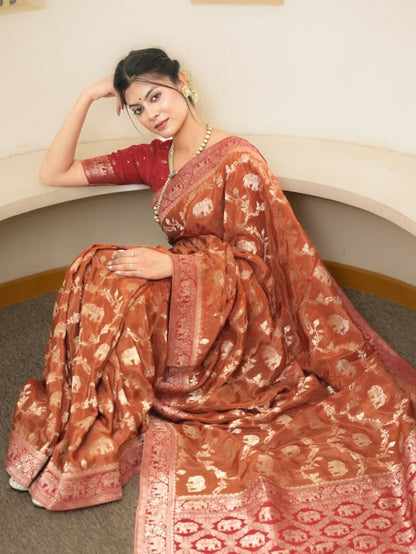 Classy Orange Soft Silk Saree With Piquant Blouse Piece