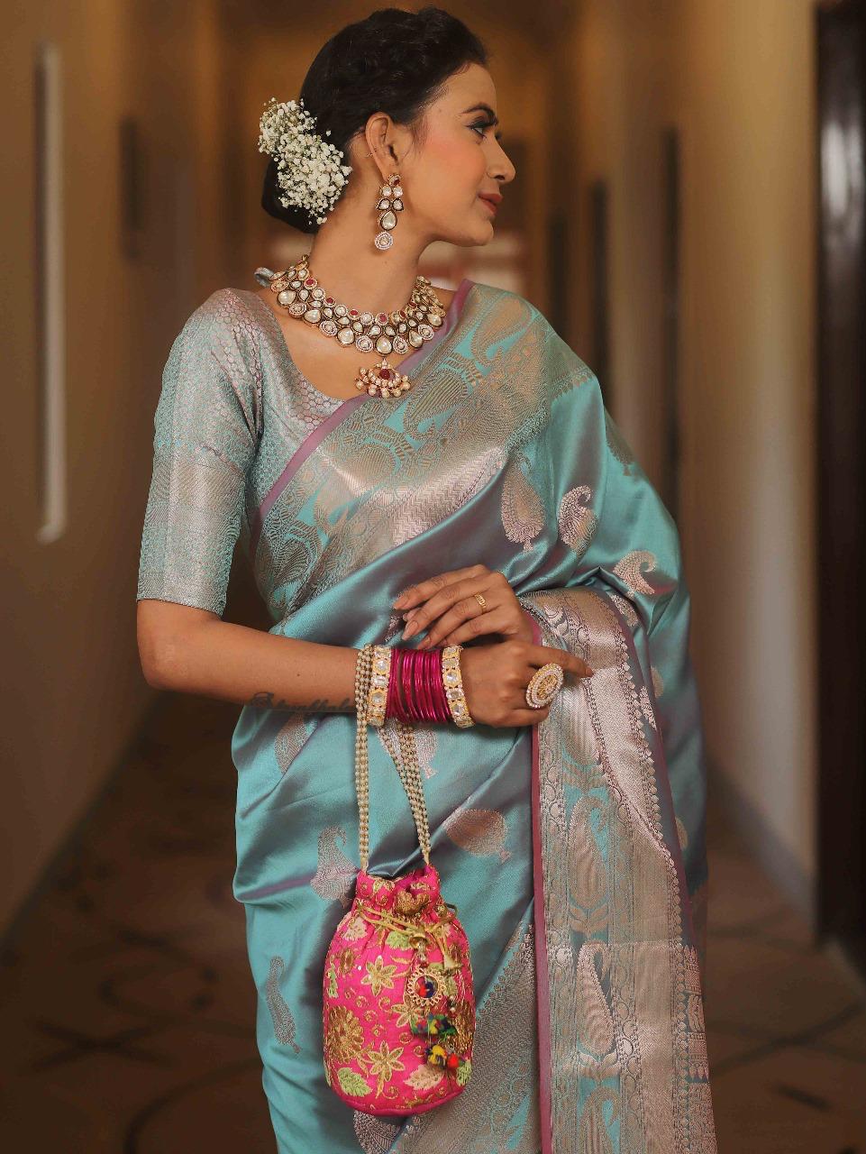 Scintillating Firozi Soft Banarasi Silk Saree With Preferable Blouse Piece