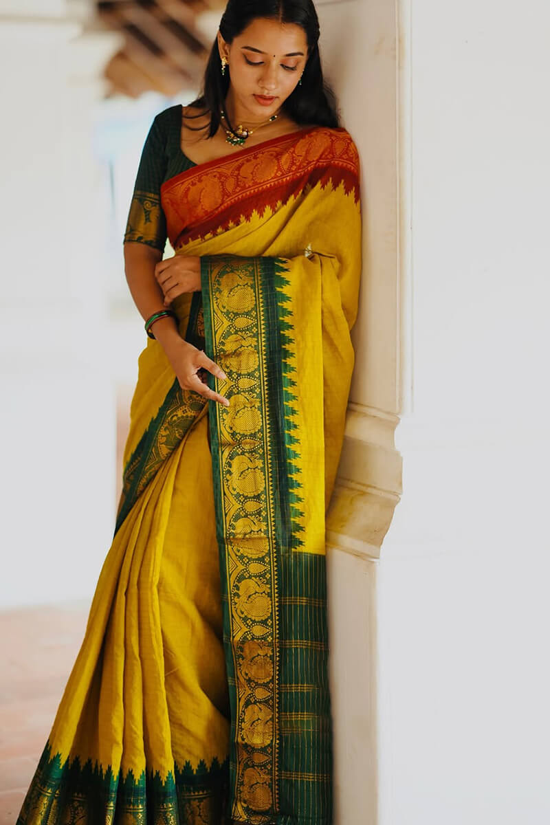 Flamboyant Yellow Soft Silk Saree With Ailurophile Blouse Piece