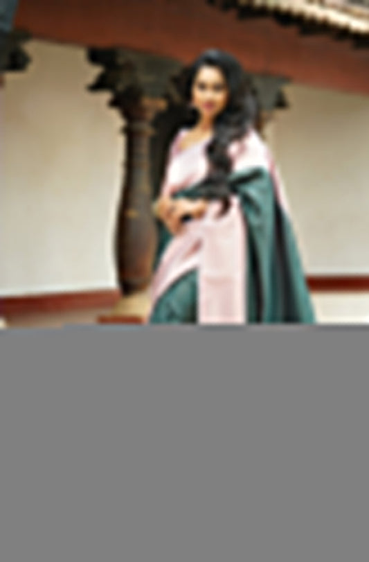 Trendy Dark Green Soft Silk Saree With Gorgeous Blouse Piece