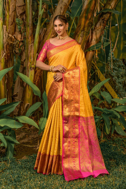 Sensational Yellow Soft Banarasi Silk Saree With Bewitching Blouse Piece