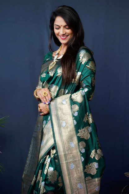Superb Dark Green Kanjivaram Silk Saree With Glittering Blouse Piece