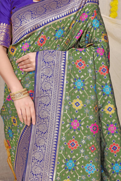Stylish Green Soft Patola Silk Saree with Demanding Blouse Piece