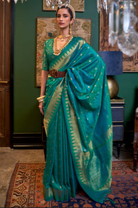 Angelic Rama Soft Banarasi Silk Saree With Bucolic Blouse Piece