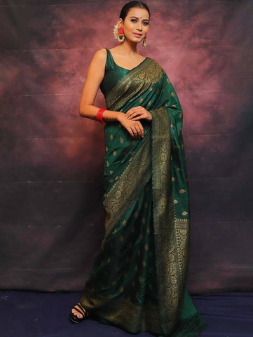 Adorning Dark Green Soft Silk Saree With Prominent Blouse Piece