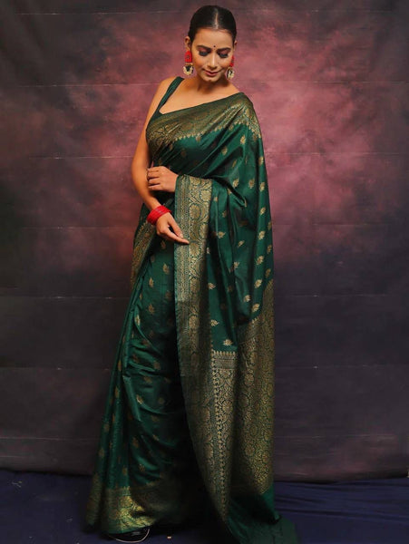 Adorning Dark Green Soft Silk Saree With Prominent Blouse Piece