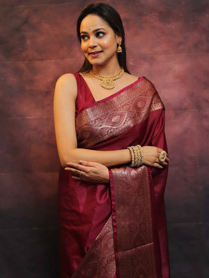 Engrossing Maroon Soft Silk Saree With Inspiring Blouse Piece