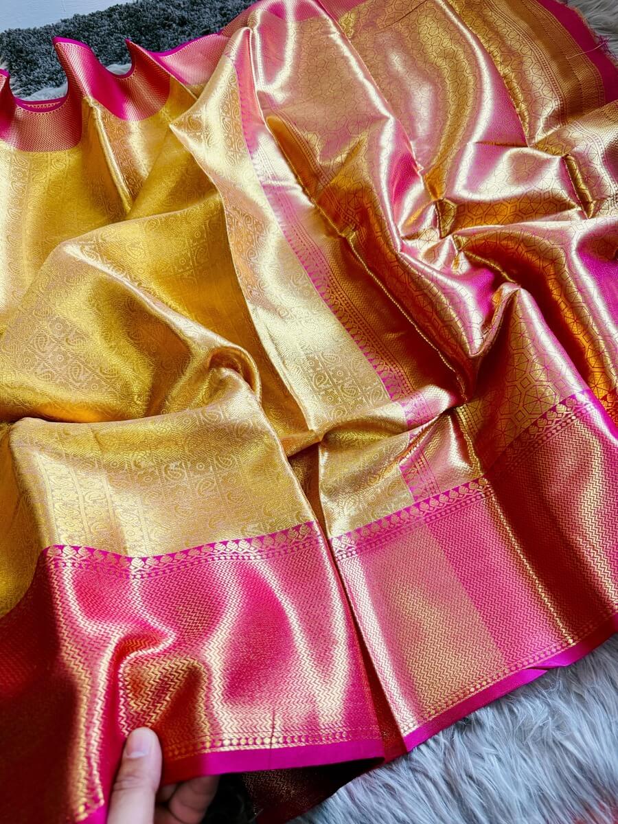 Bollywood Style Golden Soft Tissue Silk Saree With Artistic Blouse Piece