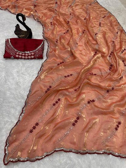 Embrocation Orange Sequence Work Fandy Silk Saree With Gratifying Blouse Piece