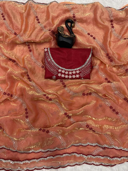 Embrocation Orange Sequence Work Fandy Silk Saree With Gratifying Blouse Piece