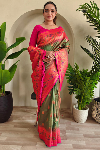 Bewitching Green Soft Banarasi Silk Saree With Embrocation Blouse Piece