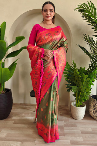 Bewitching Green Soft Banarasi Silk Saree With Embrocation Blouse Piece