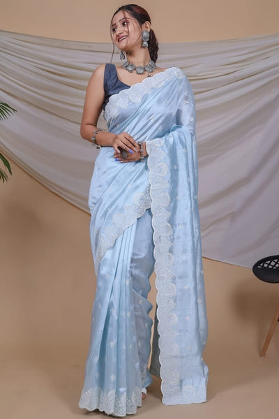 Prominent Sky Embroidery Work Soft Silk Saree With Inspiring Blouse Piece
