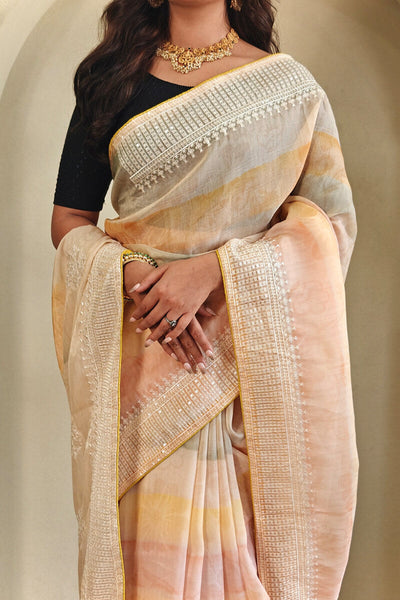 Symmetrical Peach Sequence Work Organza Silk Saree With Pulsating Blouse Piece