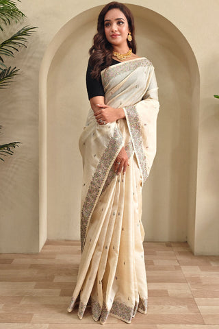 Hypnotic Beige Embroidery Work Tussar Silk Saree With Glorious Blouse Piece
