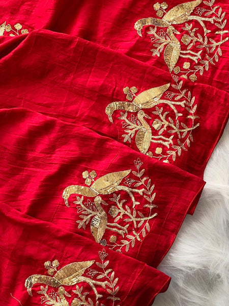 Cynosure Red Sequence Work Georgette Saree With Stunner Blouse Piece