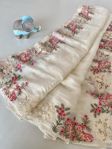 Surreptitious Off White Embroidery Work Crush Silk Saree With Jubilant Blouse Piece